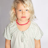 Kids childrens pink and red beaded necklace by Department Don